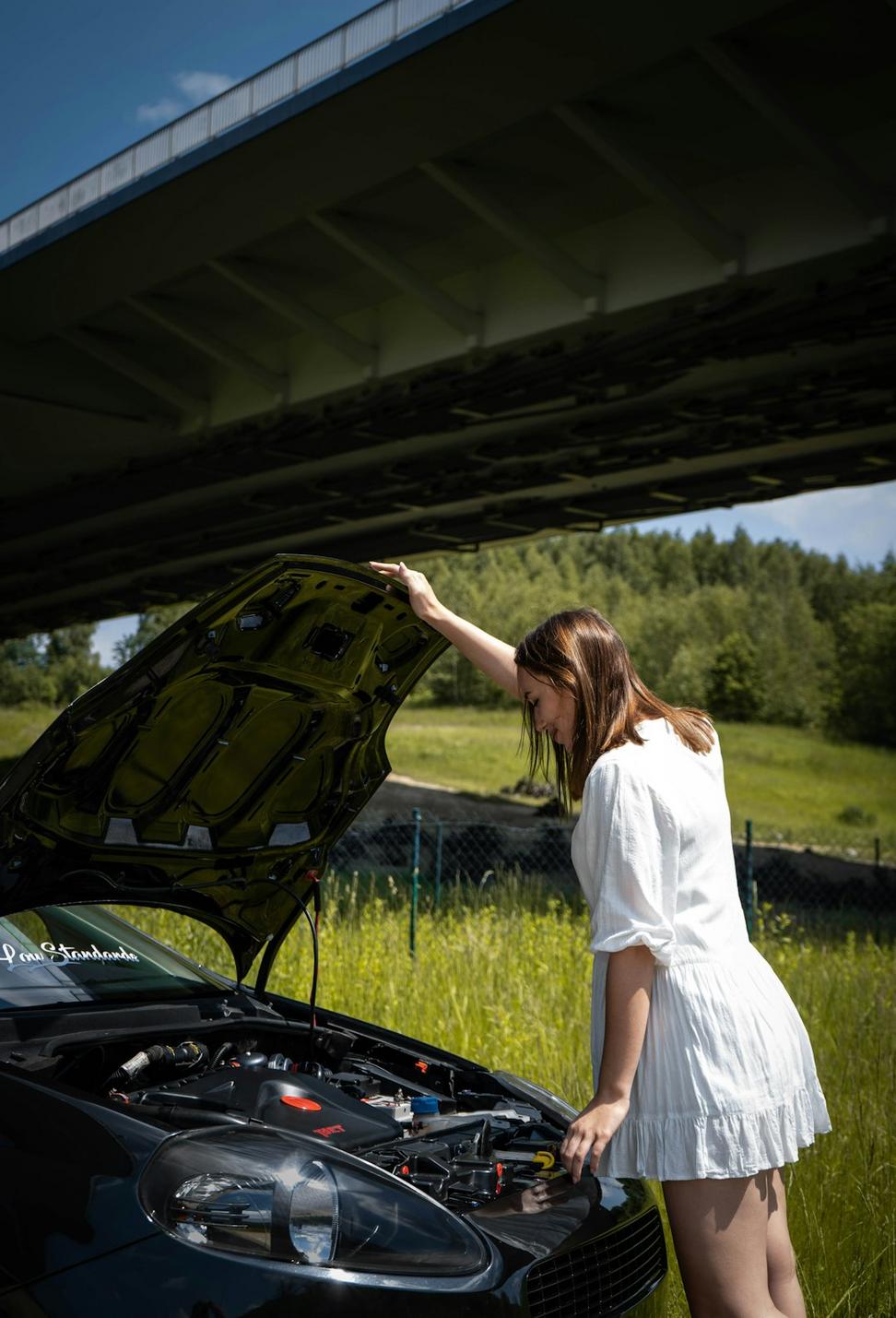 Mechanic working on luxury vehicle